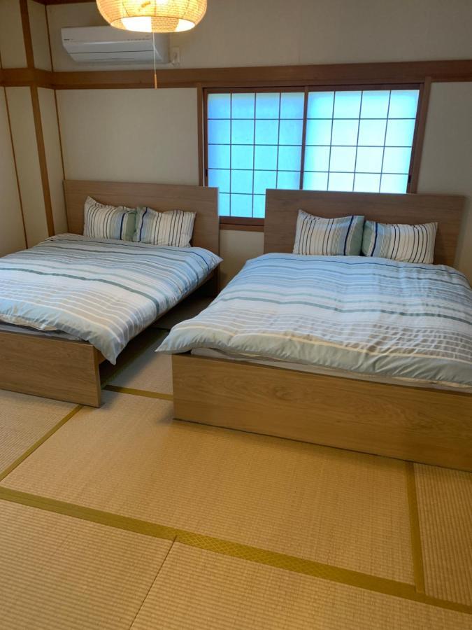 Guest House Apple Ōsaka Eksteriør bilde